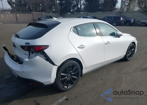 2021 Mazda Mazda3 Premium from USA, damaged, VIN JM1BPAML2M1402973